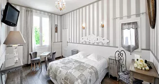 Chambre. Hôtel La Roseraie, à Chenonceaux. Chambre. Hôtel La Roseraie, à Chenonceaux.